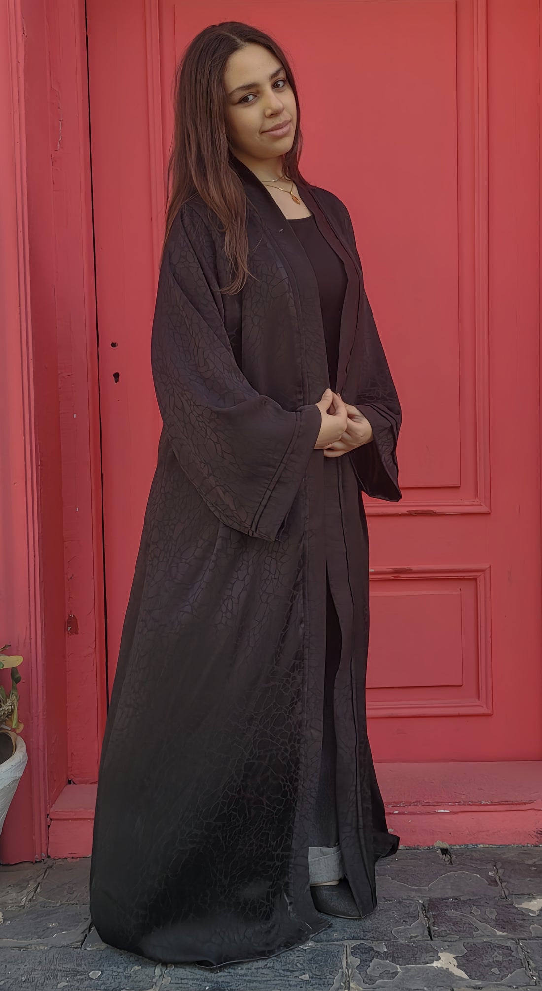 Abaya made of patterned silk fabric