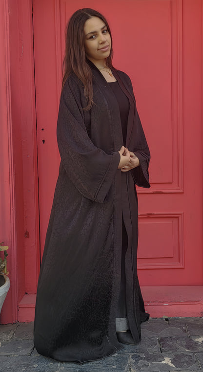 Abaya made of patterned silk fabric