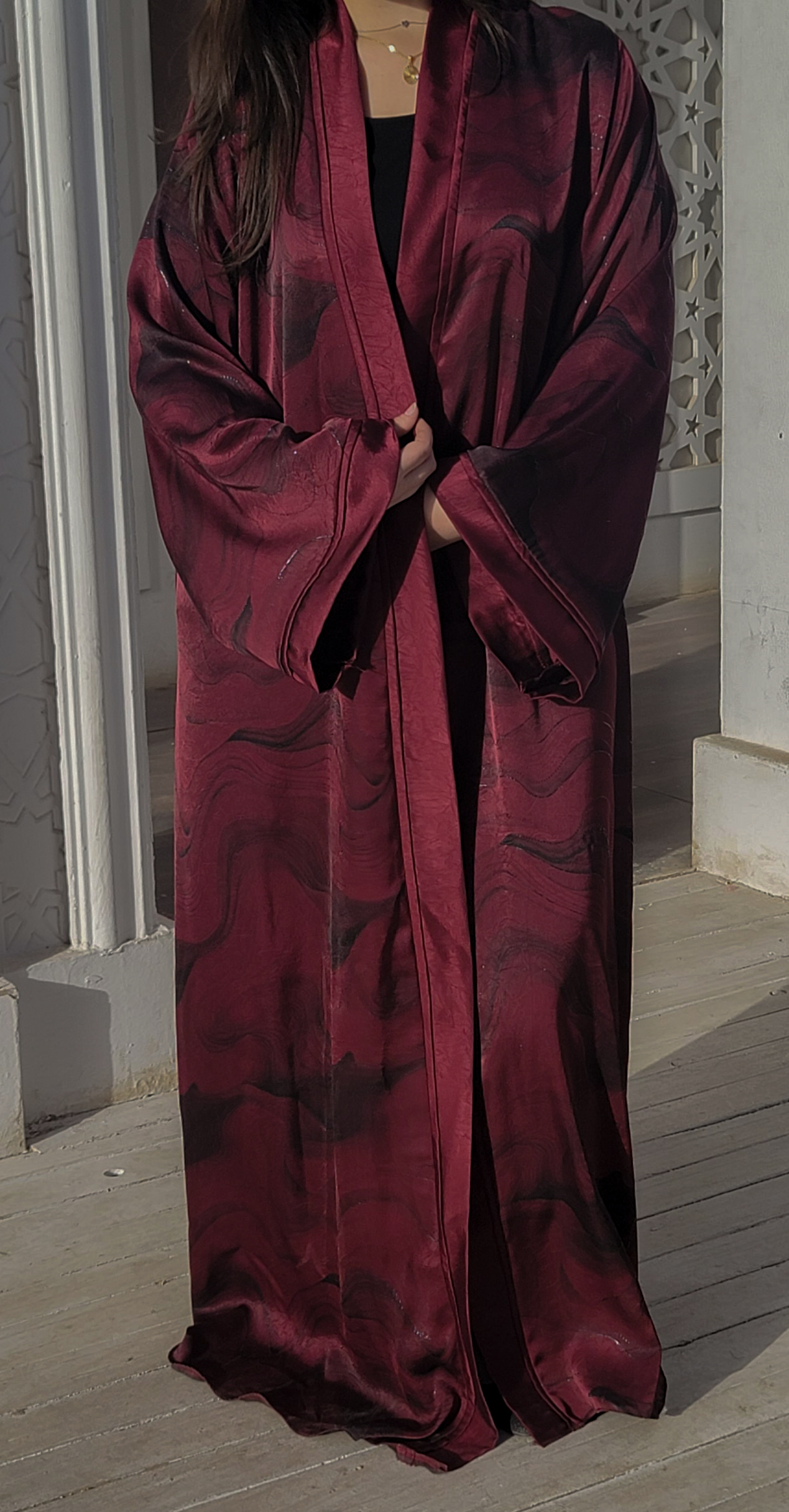 Abaya made of patterned silk fabric