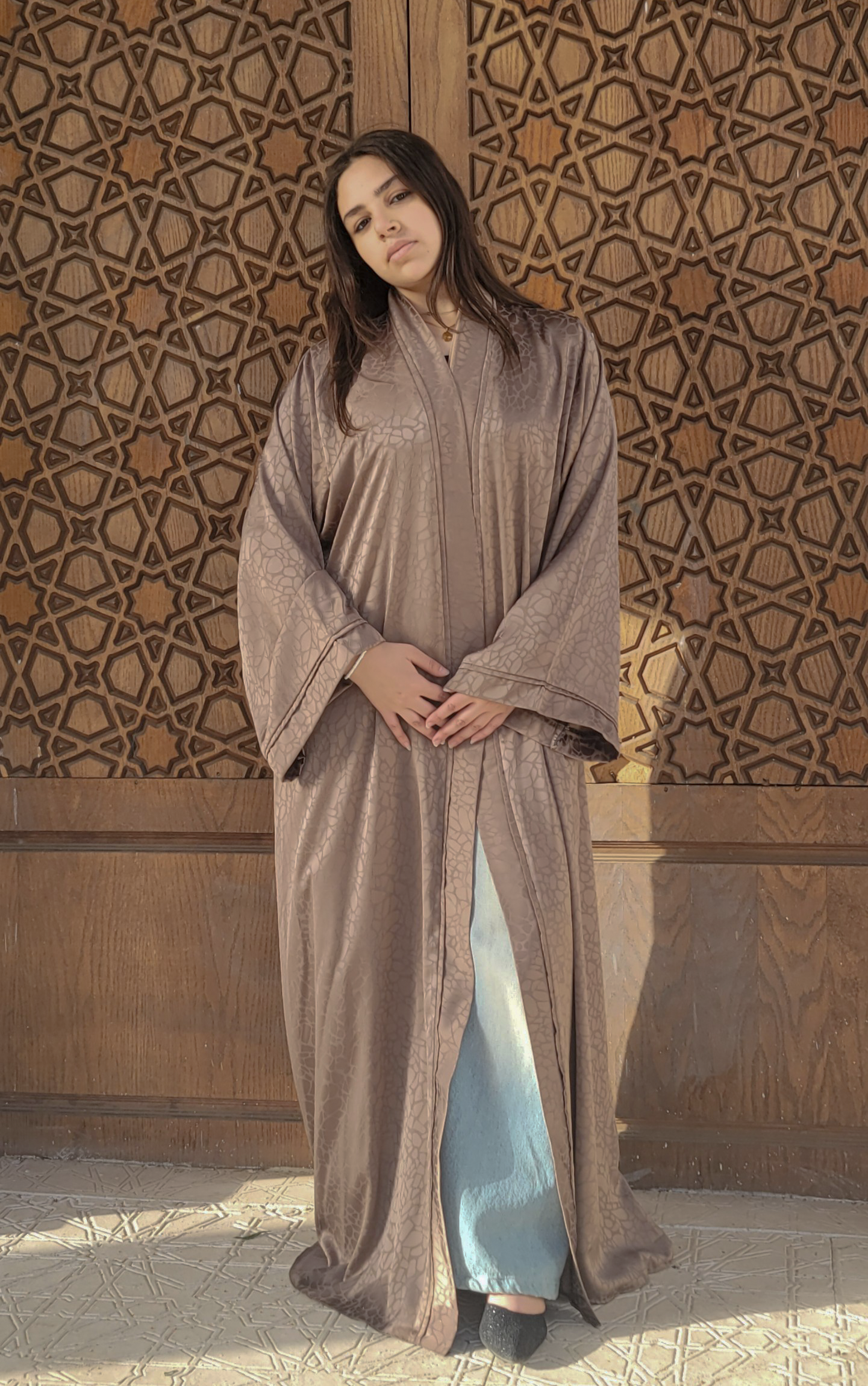Abaya made of patterned silk fabric