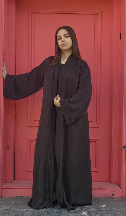 Abaya made of patterned silk fabric
