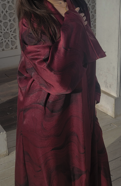 Abaya made of patterned silk fabric