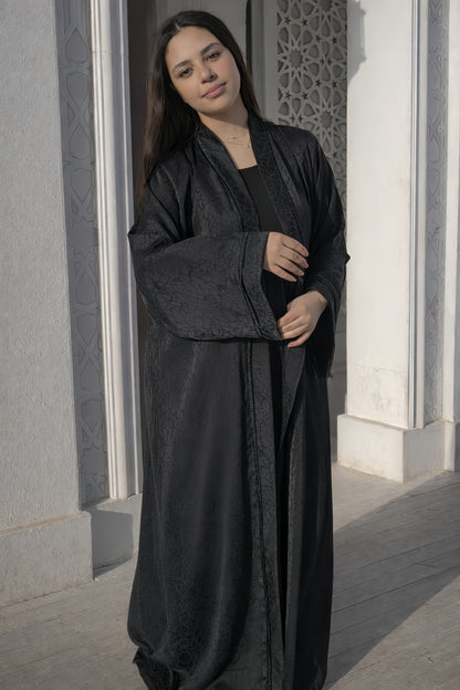 Abaya made of patterned silk fabric